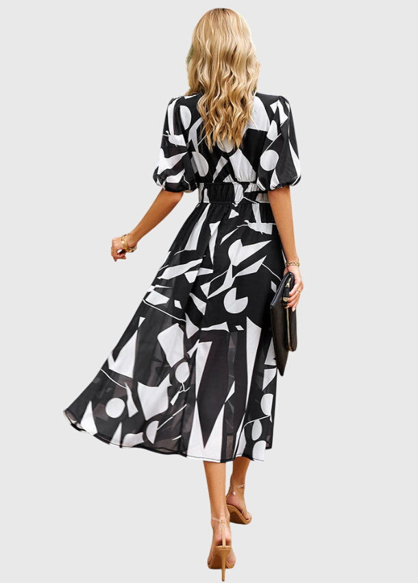Olga | Flatternde Midi Blumenkleid