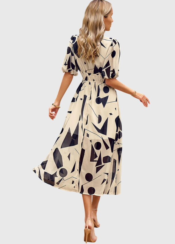 Olga | Flatternde Midi Blumenkleid